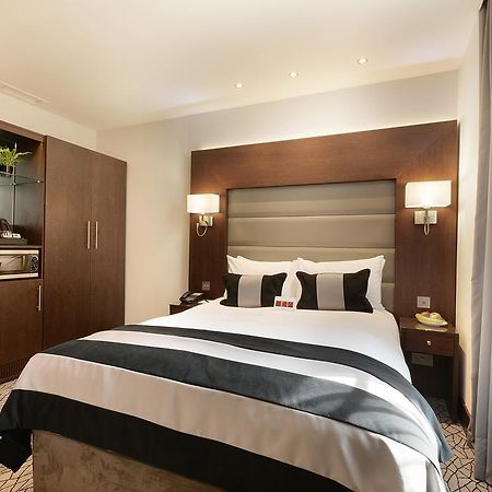 Hotel Park Grand London Lancaster Gate Zewnętrze zdjęcie A bedroom at the hotel
