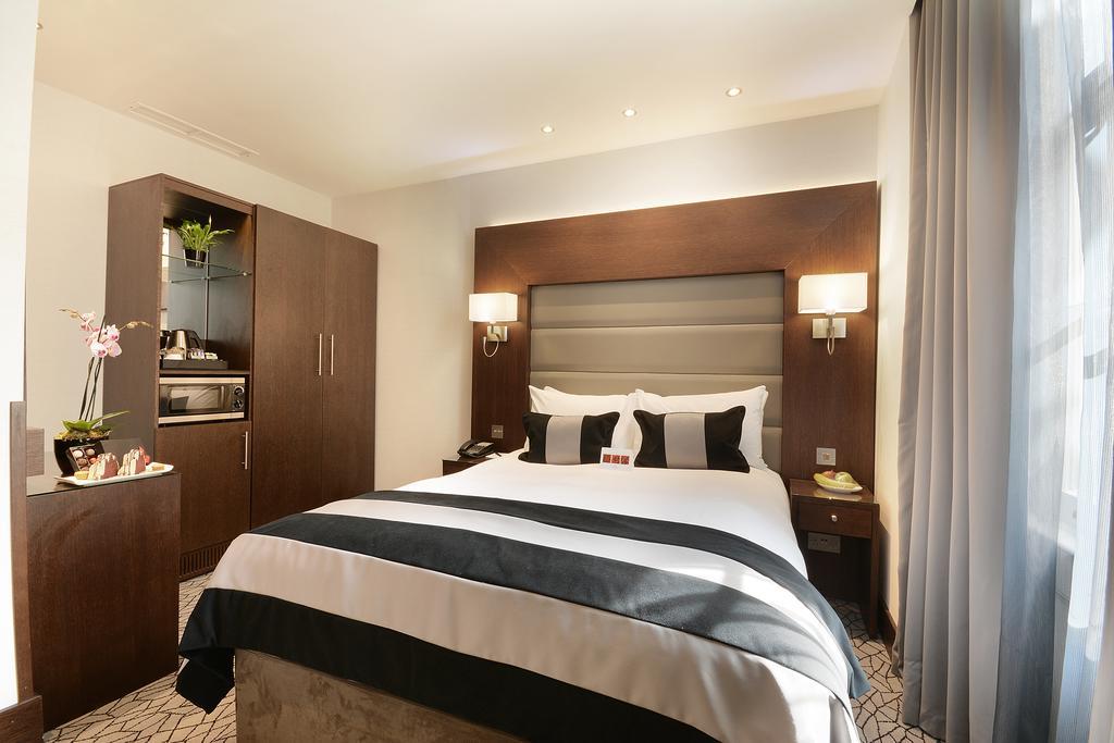 Hotel Park Grand London Lancaster Gate Zewnętrze zdjęcie A bedroom at the hotel